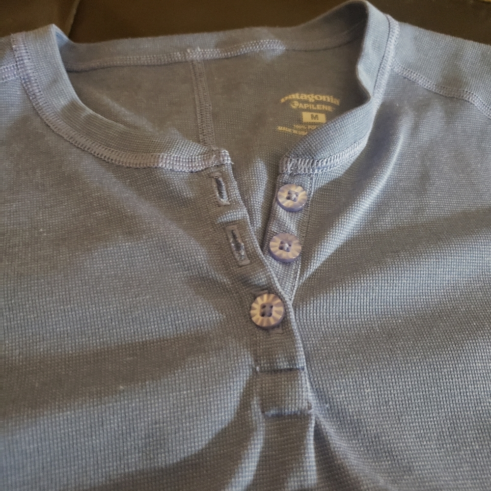 Patagonia                    Shirt color is blue,